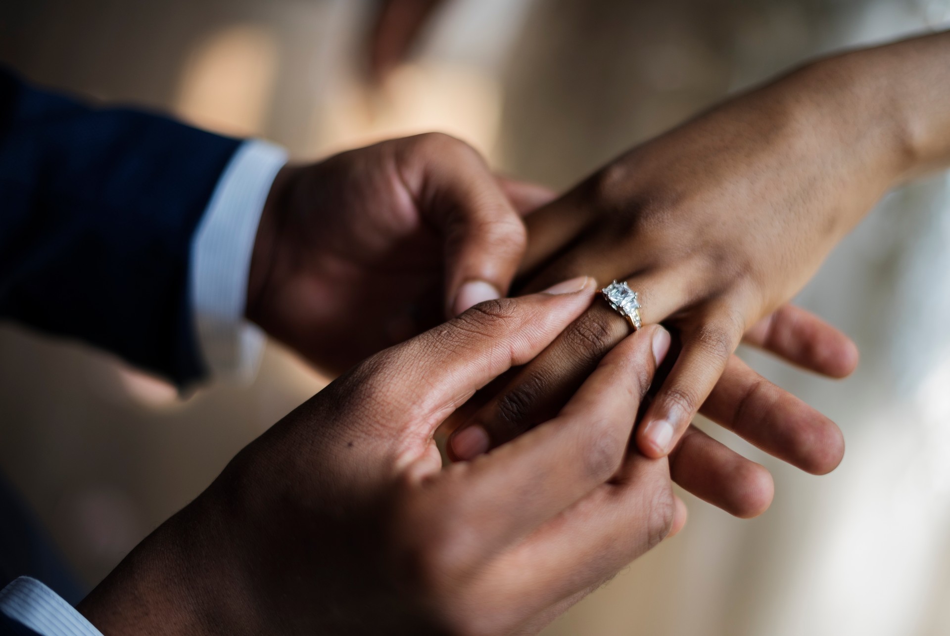 Groom Put on Wedding Ring Bride Hand