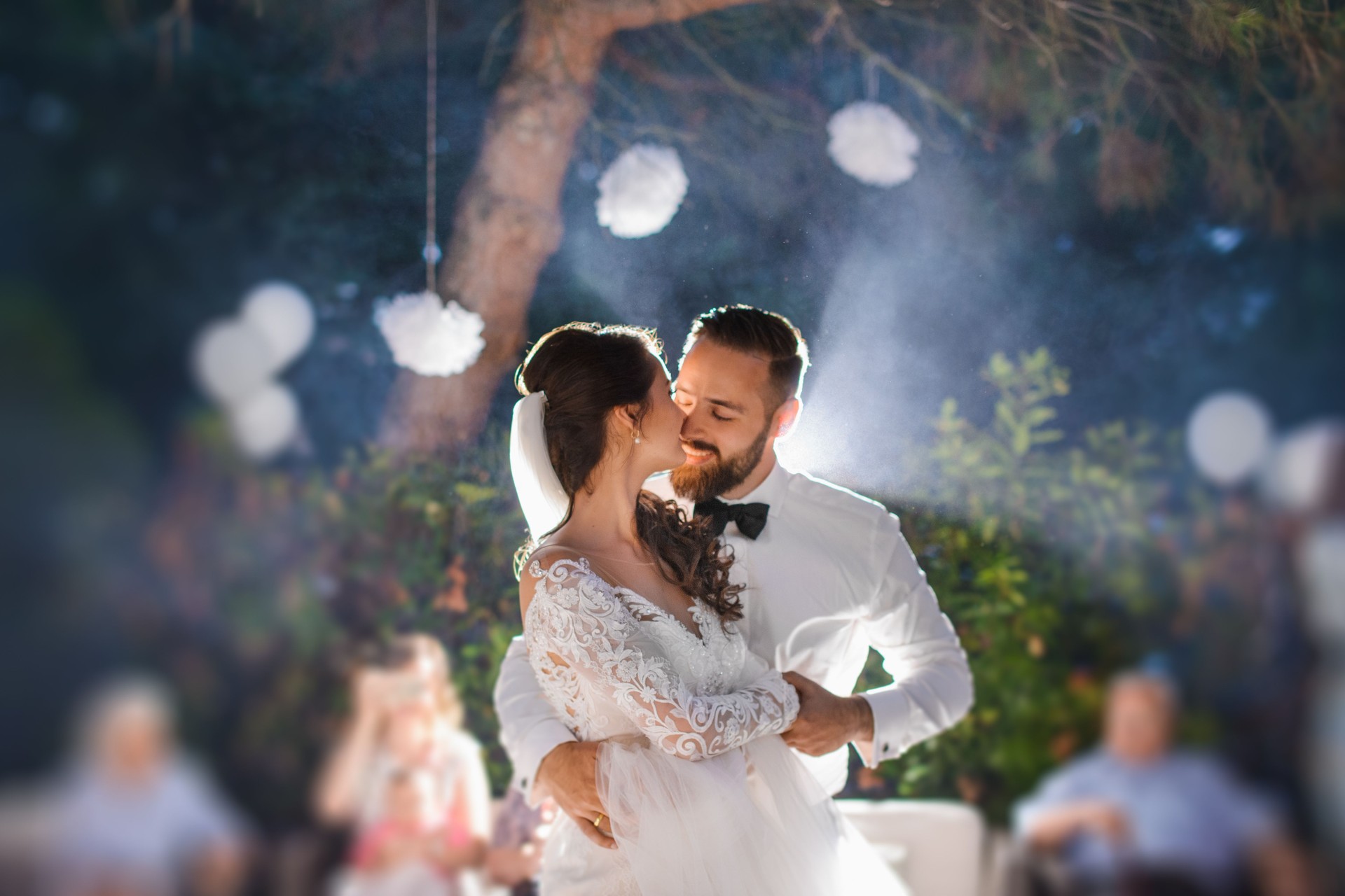 A bridal couple is dancing at the wedding night